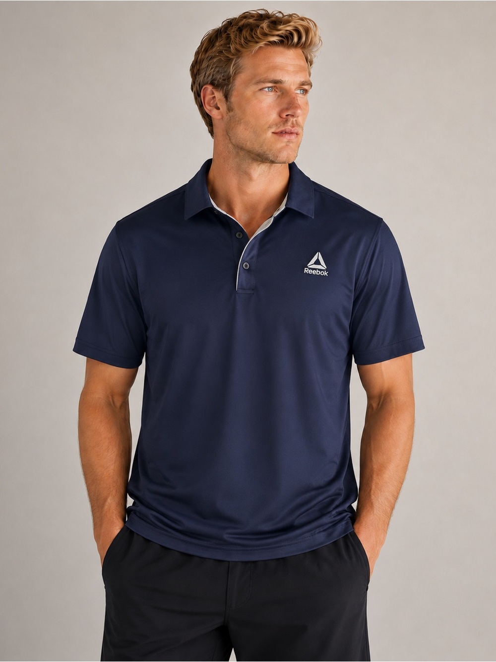 Reebok Men’s Navy Polo with White Logo